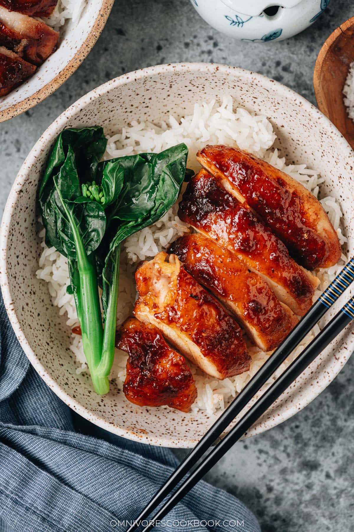 Homemade char siu chicken over rice with gai lan