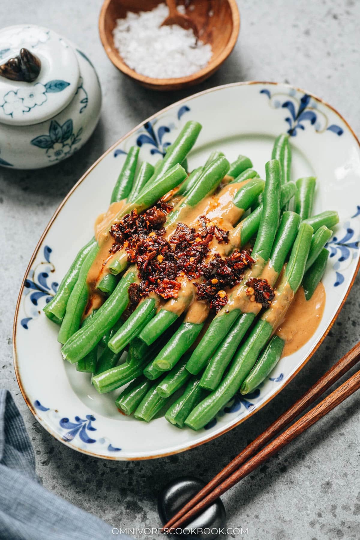 Chinese green beans with spicy peanut sauce close up